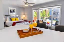 Downtown Modern Condo w/ Hot Tub & Mountain Views