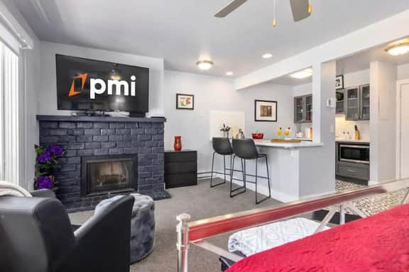 Downtown Modern Condo w/ Hot Tub & Mountain Views